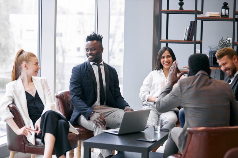 Business people in meeting sitting in modern office